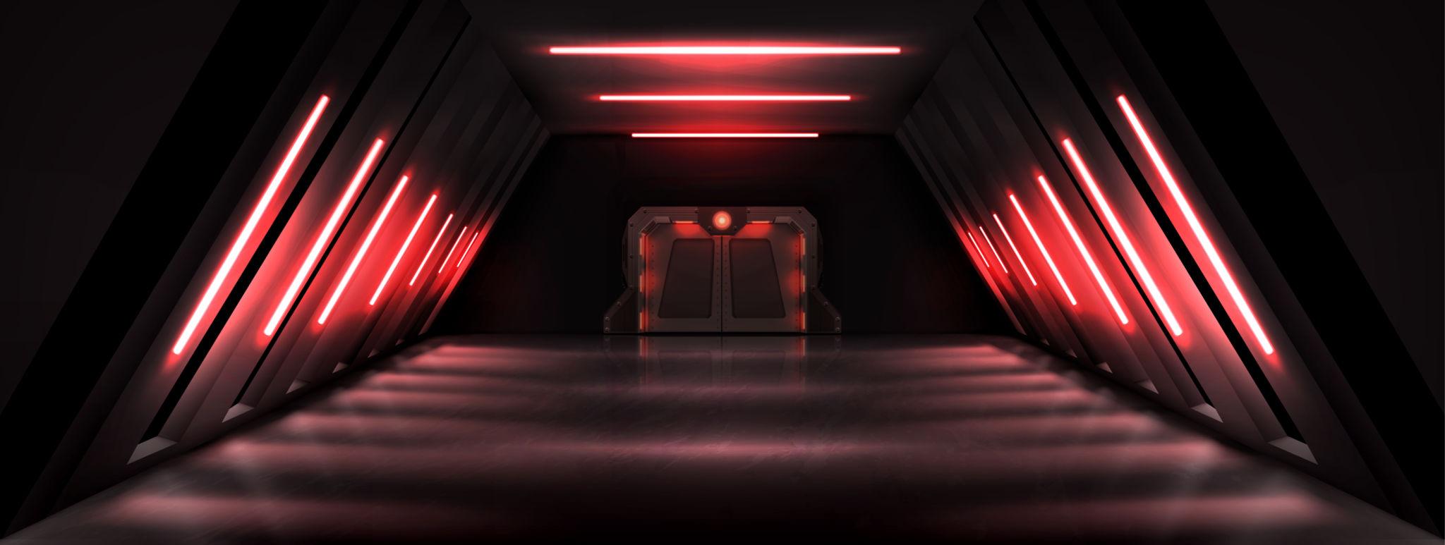 Couloir de laboratoire souterrain avec néons et lumière rouge d’alerte